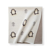 Arctic Penguins knit baby blanket folded to show front and reverse sides